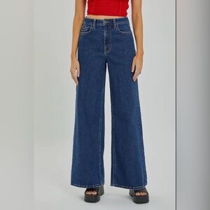 High waist, wide leg, dark wash jean.  NWT size 11